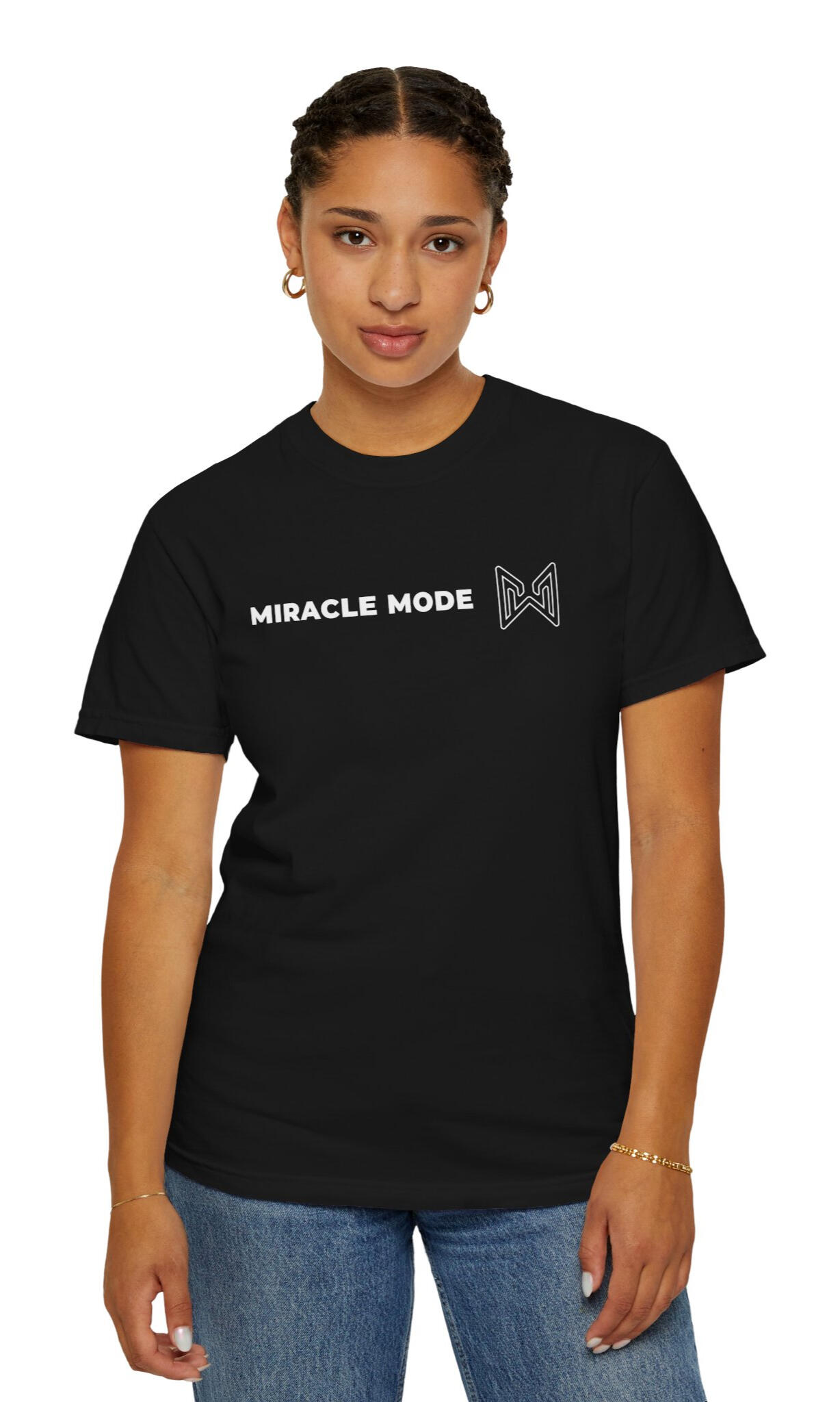 MERAQL Miracle Mode Classic Tee Woman wearing a black MERAQL Miracle Mode T-shirt with horizontal white text and an outlined emblem across the center chest.